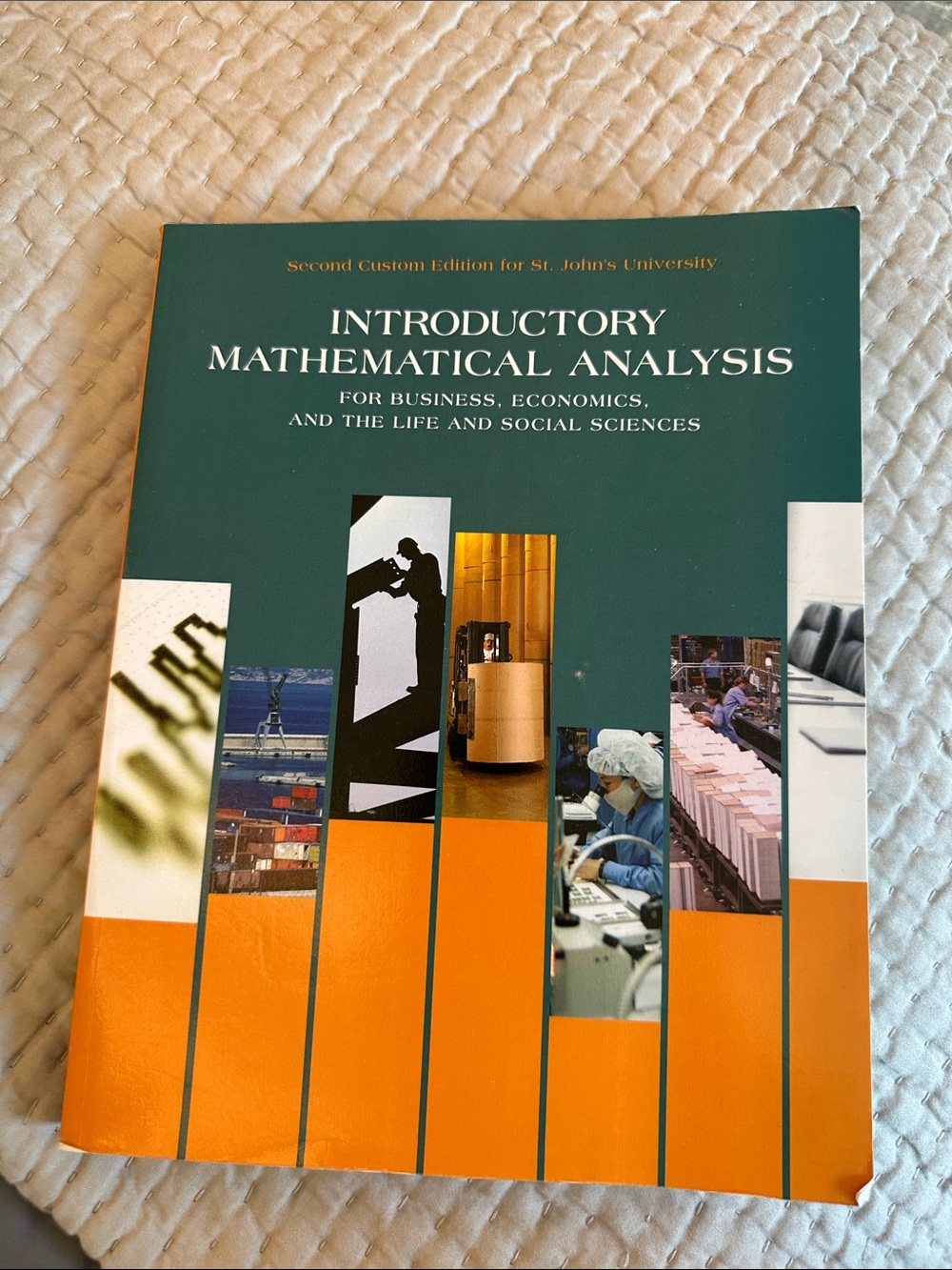 Pearson Textbook with Teal Cover and Orange Graphic